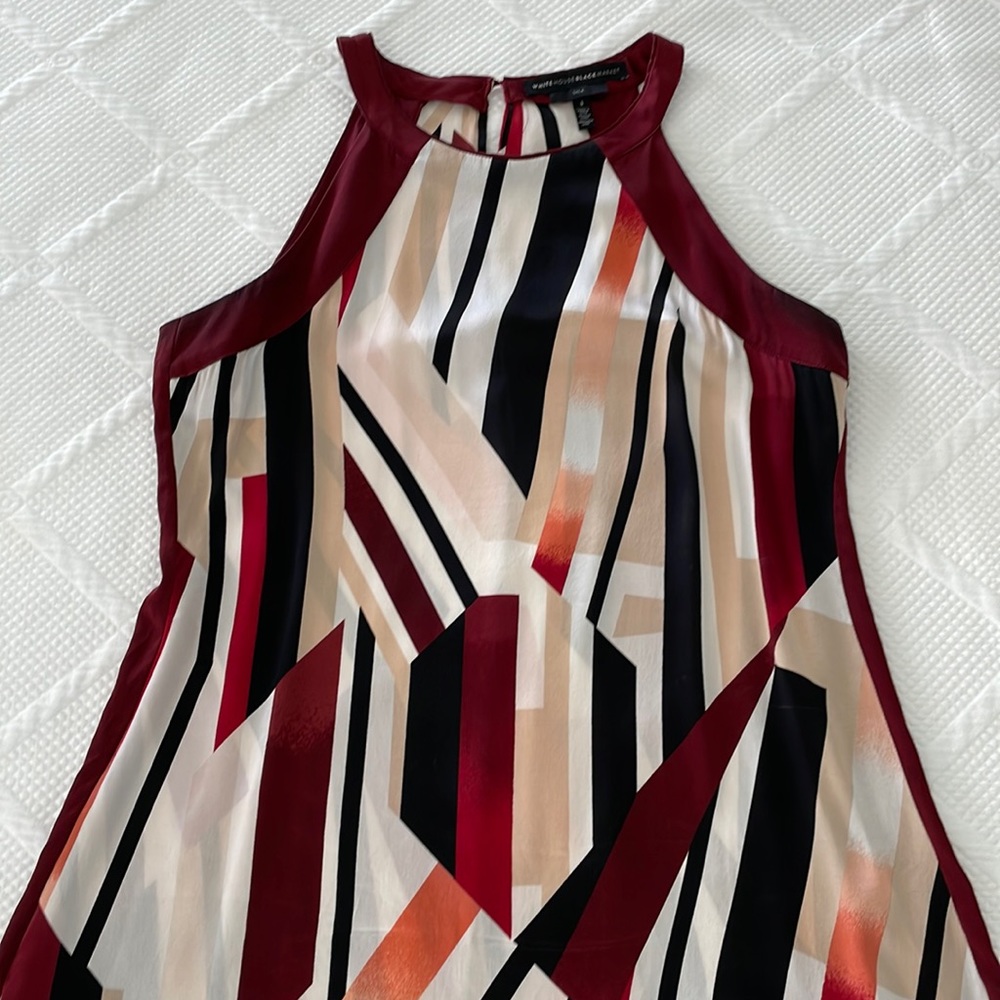 Silk top. Super cute in in good condition!
